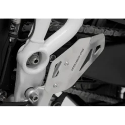 Protezione tallone sinistra Nero. Triumph Tiger 900/GT/Rally/Pro (19-).