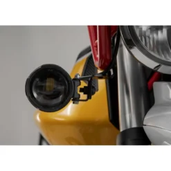 Supporto per faretti Nero. Moto Guzzi V85 TT (19-).